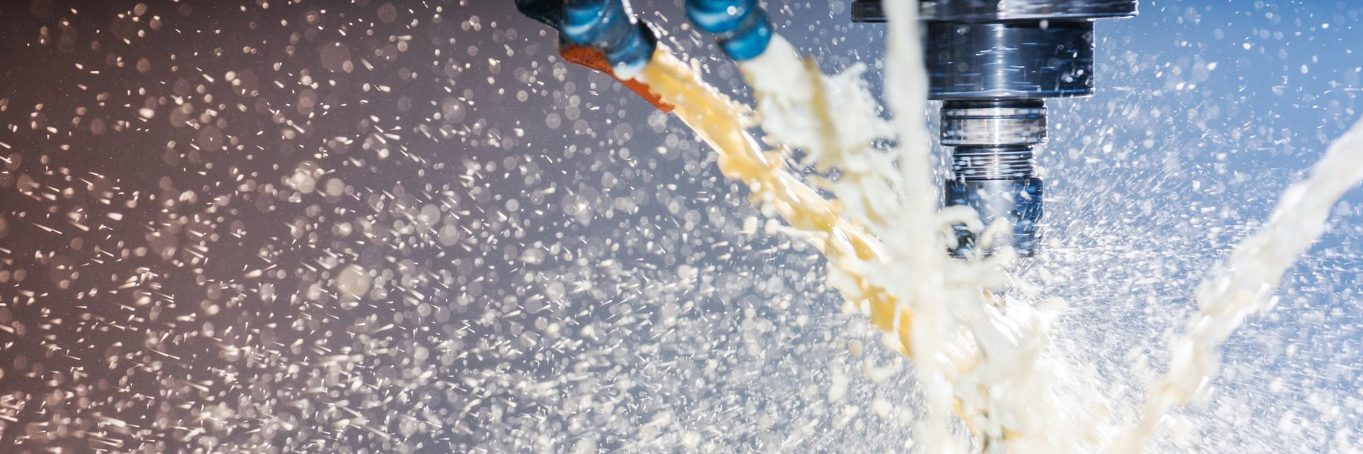 CNC milling machine and coolant in action