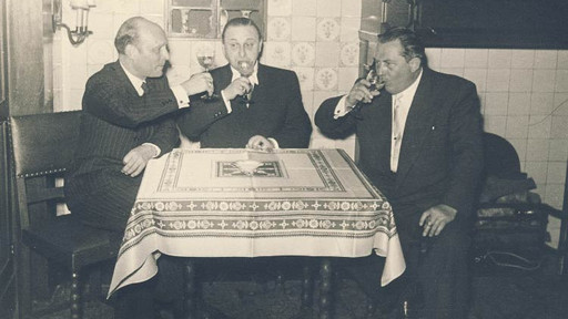 Three men at a table