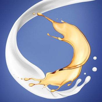 White cooling lubricant and gold-colored oil against a blue background