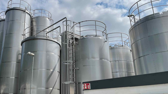 Tank depots under a cloudy sky