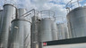 Tank depots under a cloudy sky