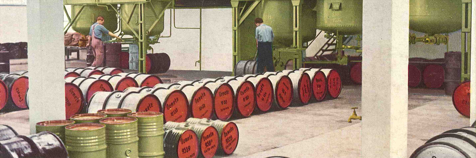 Old picture of red oil barrels