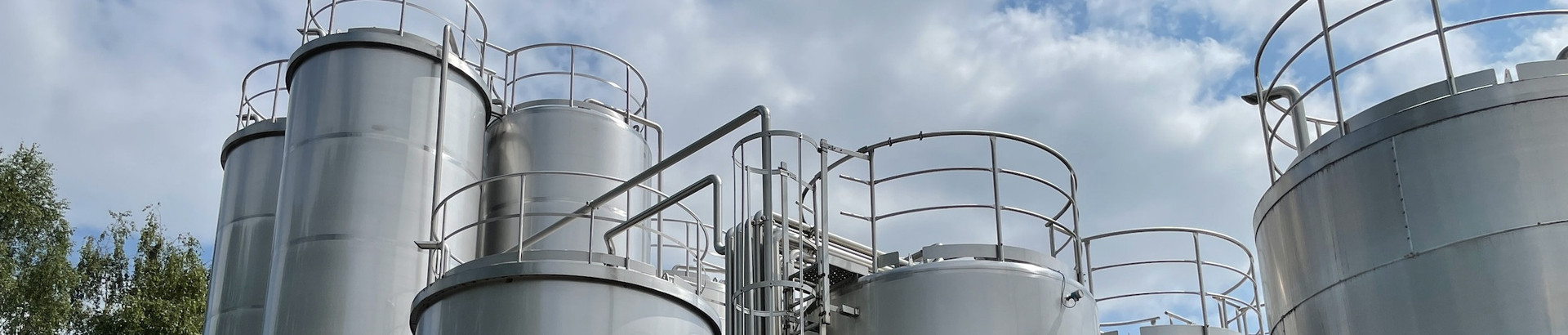 Tank depots under a cloudy sky