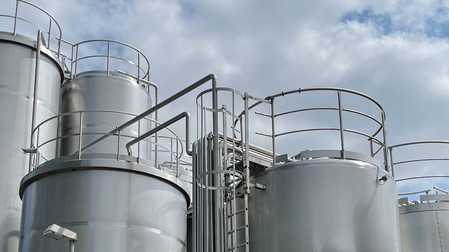 Tank depots under a cloudy sky