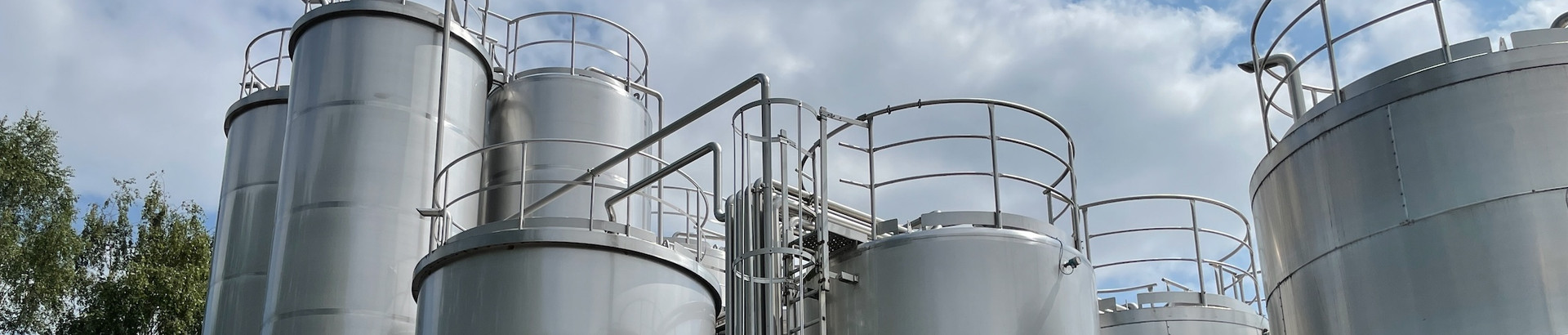 Tank depots under a cloudy sky