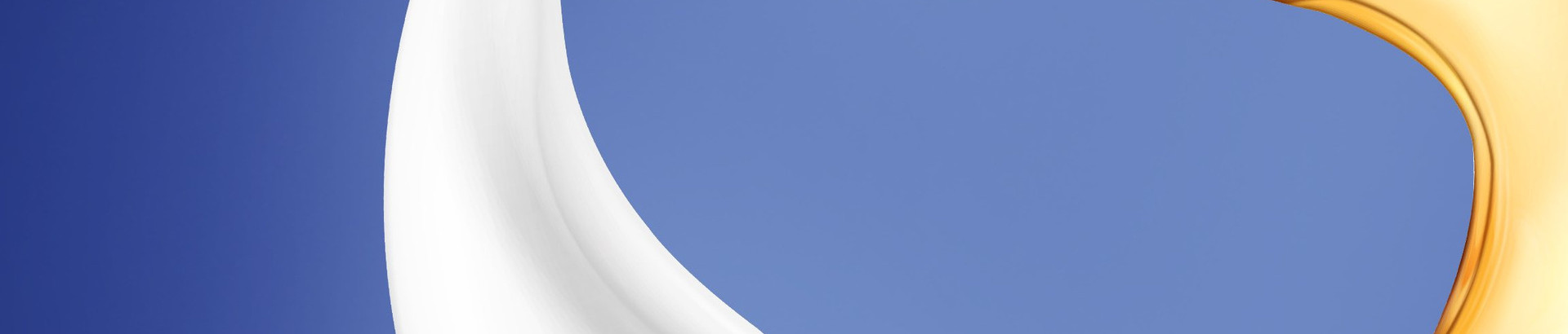 White cooling lubricant and gold-colored oil against a blue background