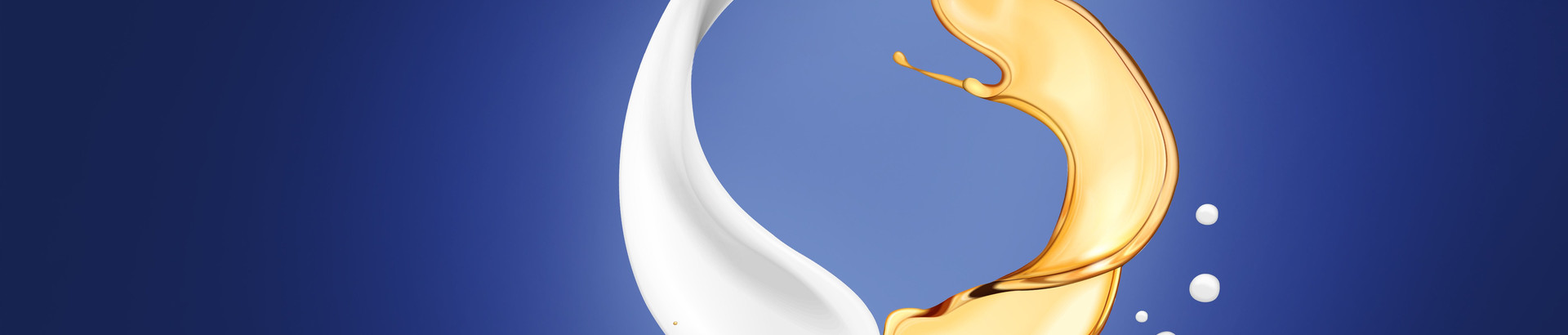 White cooling lubricant and gold-colored oil against a blue background