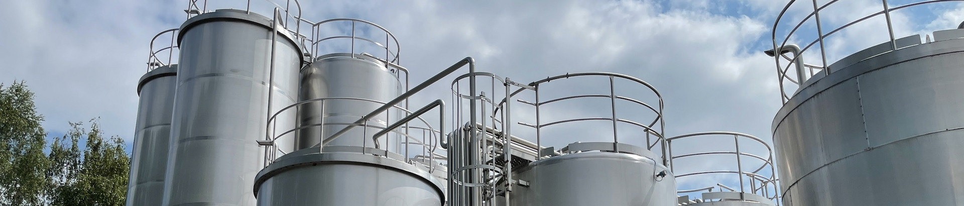 Tank depots under a cloudy sky