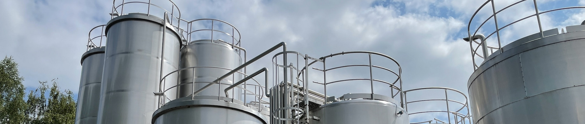 Tank depots under a cloudy sky