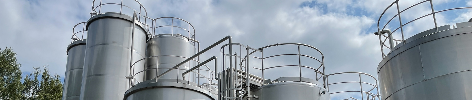Tank depots under a cloudy sky