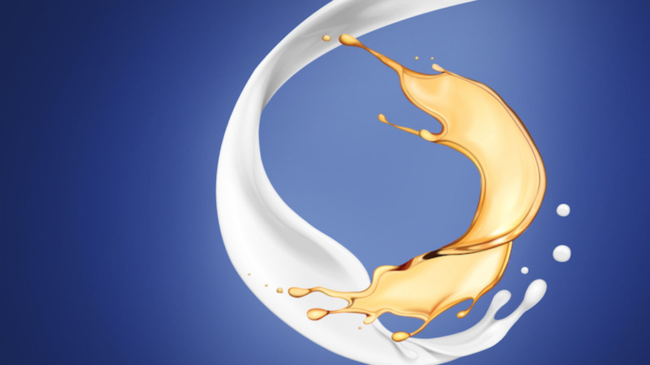 Oemeta-vision-mission-statement White cooling lubricant and gold-colored oil against a blue background
